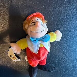 Disney Plush Tweedle Dum Toy with Red, Yellow, and Blue Outfit
